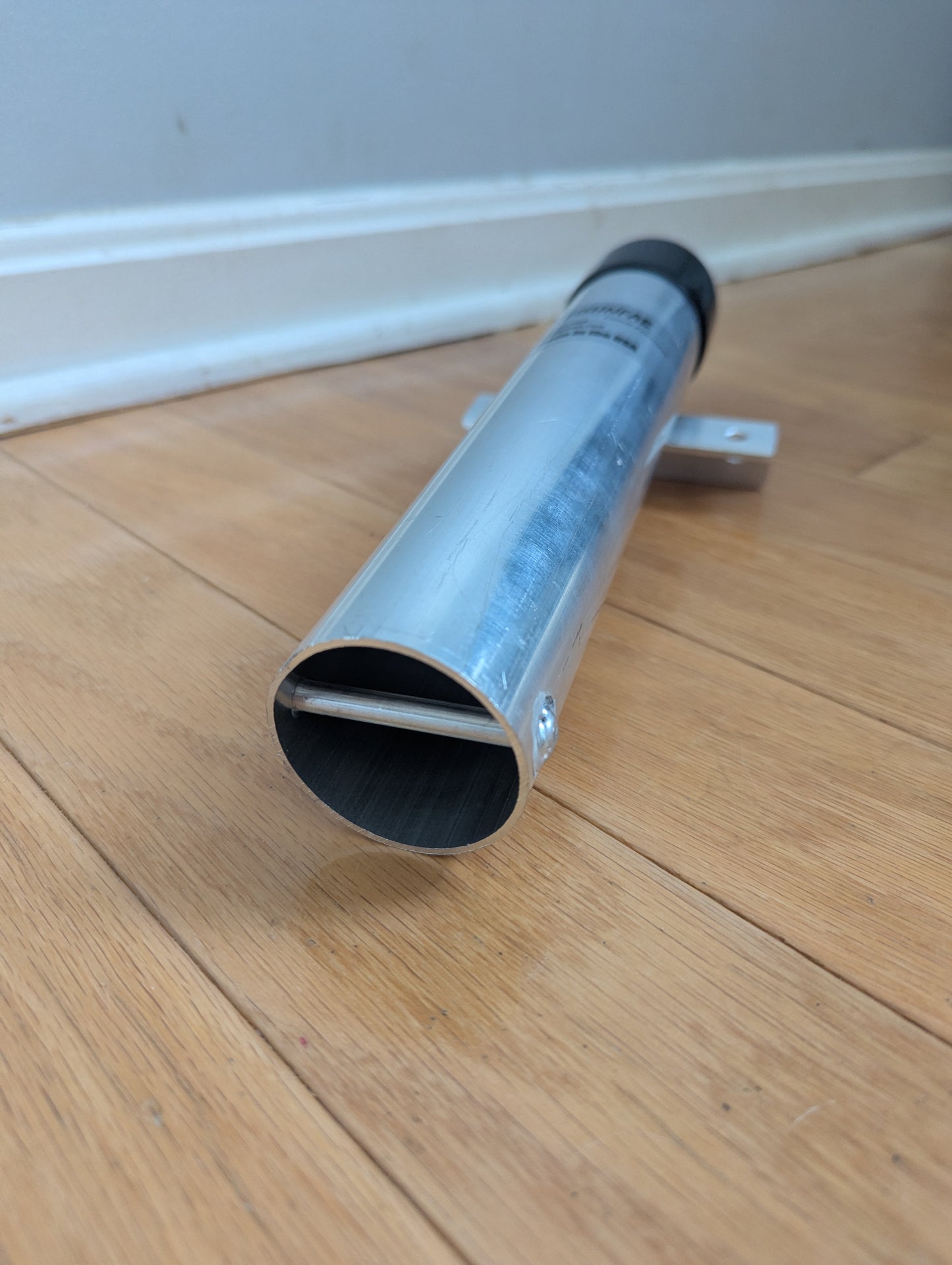 Bolt-on surf cart rod tube holder